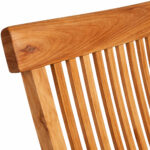 Close-up of teak garden chair backrest showing natural wood grain and vertical wooden slats