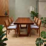 modern dining room setup with suar wood table and teak rattan chairs warm natural interior
