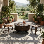 Dark round teak table with wooden chairs on a terrace