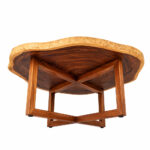 Nunu Round Coffee Table suar wood bottom view showing solid cross base construction and natural wood texture