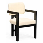Rivelle Teak Wood Dining Armchair with cream upholstered seat and black wood frame, front three-quarter view