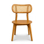 Peanut Teak Rattan Dining Chair in natural finish, front view showing the peanut-shaped backrest and woven rattan cane webbing