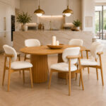 Modern solid teak oval pedestal dining set with upholstered chairs in contemporary kitchen interior