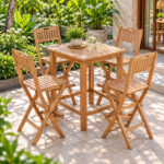 Gajayana teak folding outdoor bar chairs in garden dining setting