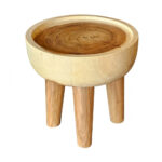 Round suar wood side table with bowl shaped top and natural wood grain