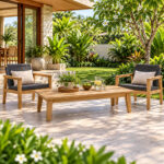 Nimas teak outdoor coffee table with lounge chairs in garden