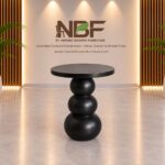 Orbella sculptural suar wood side table in NBF studio