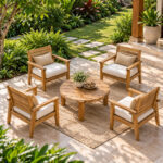 Solid Teak Three-Leg Coffee Table with Round Slatted Top and Teak Lounge Chairs