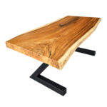 Z-Forge Suar wood dining table showing natural wood grain and geometric iron base design
