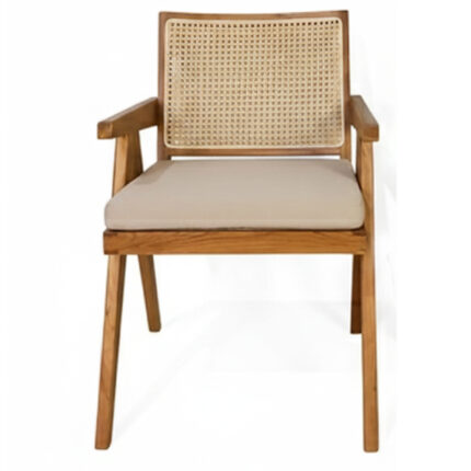 Front view of teak dining armchair with woven rattan backrest and beige upholstered seat