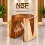ArcoForm sculptural wooden stool displayed in the NBF furniture studio