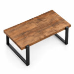 Solid teak rectangular coffee table with natural wood grain and black metal legs top view