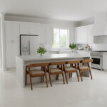 Solid Suar wood dining armchairs with beige upholstered seats arranged at a kitchen island