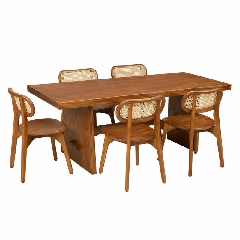 Artisan solid Suar wood dining table paired with teak wood dining chairs featuring woven rattan backrests