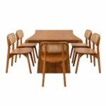 Teak wood dining chair with curved frame and woven rattan backrest shown from the side