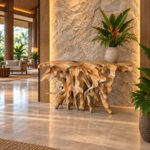 natural teak root console table in luxury interior with stone wall