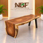 Arvana Suar wood waterfall dining table displayed in the Niwara Bisoepo Furniture showroom