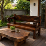 Bagong Suar Wood Bench with curved armrests and brown finish paired with a natural wood coffee table on a covered terrace