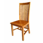 Three-quarter view of Balero solid teak wood dining chair in a warm brown finish