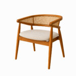 Bravelle teak dining chair with woven cane backrest and upholstered seat rear view