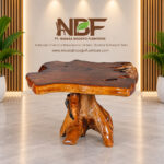 Dhifa teak root pedestal side table displayed in the NBF furniture studio