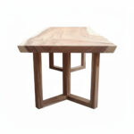 Side view of the Fina Suar wood dining table showing its geometric frame-leg construction Salin SEO Foto
