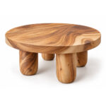 Grainora Suar wood coffee table with a thick round top and four rounded legs