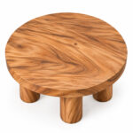 Top view of the Kavana round suar wood coffee table showing its circular shape and natural wood grain
