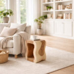 Lenggok Suar wood stool used as an accent table in a modern living room