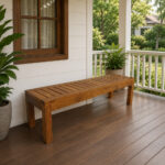 Minimalist teak wood bench on a wooden outdoor terrace