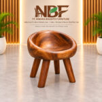 Nestra solid wood lounge chair displayed in the NBF furniture studio