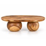 Front view of Nuvora solid Suar wood coffee table with sculptural ball-shaped bases