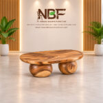 Nuvora sculptural Suar wood coffee table displayed in the NBF furniture studio