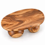 Top view of Nuvora oval solid Suar wood coffee table showing natural wood grain