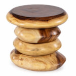 Close view of the rounded sculptural sections and natural wood tones of the Nuvora accent table