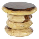 Sculptural Nuvora round Suar wood side table with natural contrasting wood grain