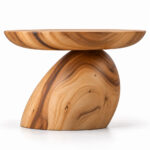 Organic Suar wood side table showing natural grain and a curved pedestal