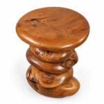 Top view of the Arvana Suar wood side table showing its rounded tabletop and natural wood grain