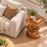 Close-up of natural Suar wood grain and organic knots on the Arvana side table