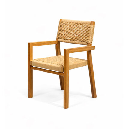 Three-quarter view of a solid teak dining chair featuring a woven seat and matching woven backrest