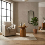 Solid teak drum side table beside modern sofa in living room