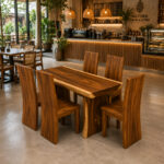 Solid Suar Wood Dining Table and Four Block-Style Chairs in a Restaurant Interior