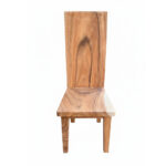 Solid Suar wood block dining chair highlighting natural timber grain and its distinctive high backrest