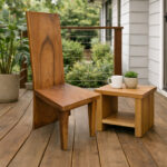 Solid Suar wood high back chair paired with a matching wooden side table on a covered terrace
