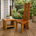 Solid Suar wood H-design accent chair paired with a wooden coffee table on a covered terrace