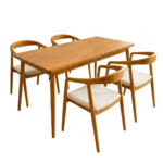 Solid Teak Dining Table with 4 Cushioned Selly Chairs on a white background
