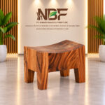 Suarvo Suar wood stool displayed in the Niwara Bisoepo Furniture studio