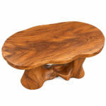 Top view of the Sylvara Suar wood coffee table highlighting its flowing organic shape and natural wood grain