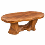 Front view of the Sylvara sculptural coffee table showing its organic solid wood base and curved tabletop