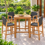 Solid teak rope woven outdoor bar chairs in garden setting